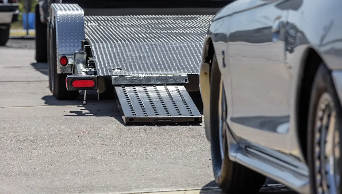 Loading a vehicle onto the Steel Deck Car Hauler
