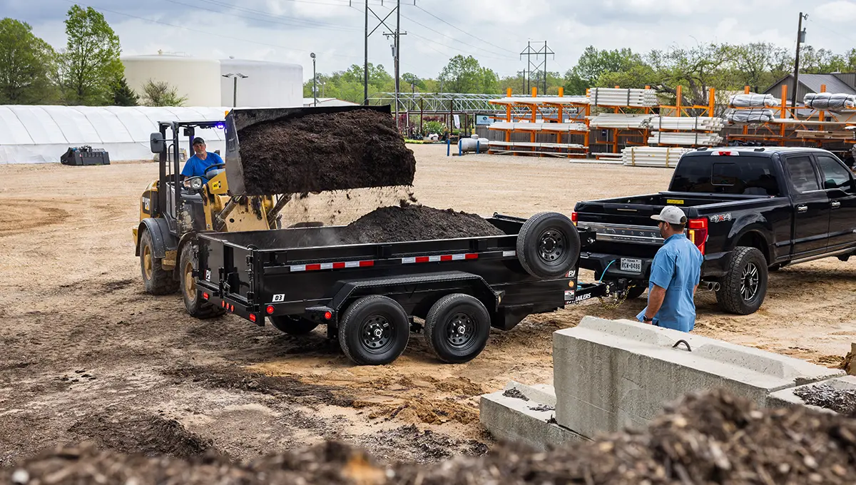 Loading mulch into the 72